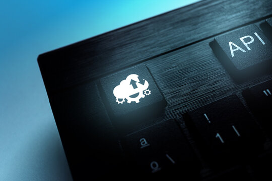 Keyboard with API acronym word icon to push button. Internet and technology concept. Business, programming, interface, application and network.
