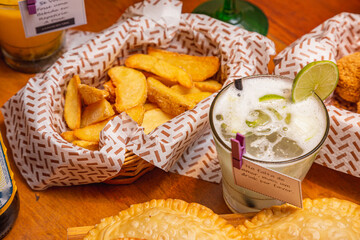 rustic roasted potatoes, french fries, typical Brazilian bar food, served with lime caipirinha.