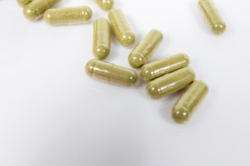 Andrographis paniculata capsules isolated on white