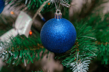 Christmas.New Year's toys on the Christmas tree close-up.