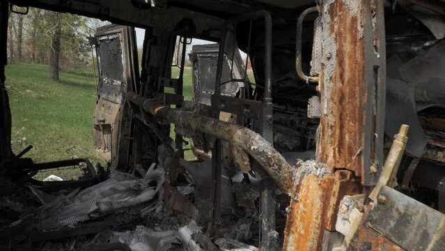 A burnt and destroyed armored car of the Russian army as a result of a battle with Ukrainian troops near Kyiv