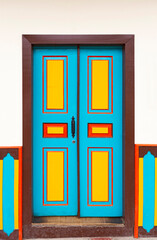 Beautiful doors and facades of the houses Salento city in Colombia