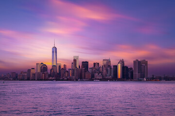 Fototapeta na wymiar New York City Manhattan downtown skyline at dusk with skyscrapers over Hudson River, USA