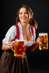 Oktoberfest server holding beer and smiling - 502244454