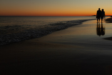Long shot of a sunset beach