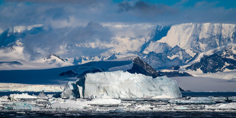 Tabular Iceberg in front of Antarctic Peninsula pictured inside Larsen A inlet with a very scenic...