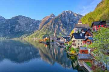 Scenic picture-postcard view of famous Hallstatt mountain village in the Austrian Alps at beautiful light in spring, Salzkammergut region, Hallstatt, Austria