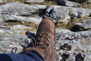 hiking boot on rocks
