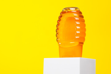 Honey product for breakfast. Eating sweet honey from a jar. Organic dessert food.