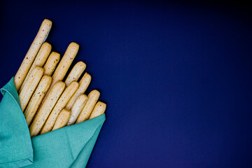 Breadsticks on dark background