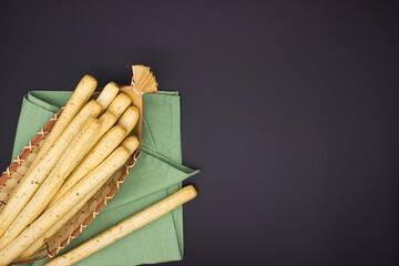 Breadsticks on dark background