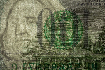fragment of 100 dollar banknote with visible details of banknote reverse - obrazy, fototapety, plakaty