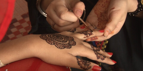 henna tattoo on hands