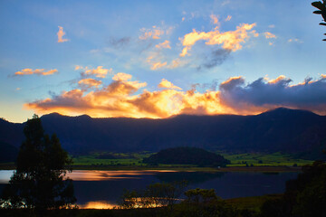 crater of volcano at sunset with beautiful lake in first plane in tepetiltic nayarit 