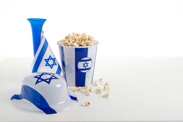 Items depicting Israeli symbols, popcorn, the concept of the holiday Independence Day