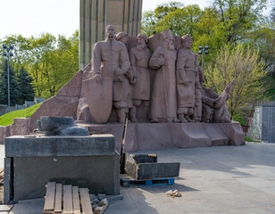 Partially destroyed monument near Arch of friendship of peoples Kyiv Ukraine