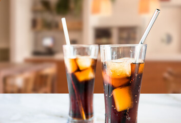 glasses of cola with ice in a restaurant, soda. 