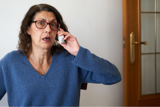 Senior Woman Shocked By Bad News On The Phone