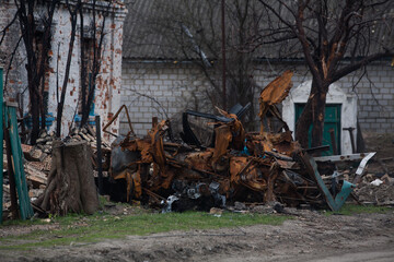 Burnt civilian car after Russian shelling
