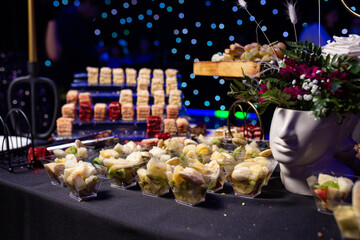 fruit slicing in plastic cups on the catering