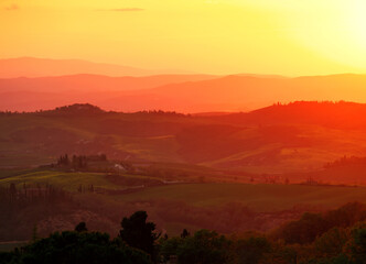 Crete Senesi rural landscape. Green fields of Tuscany near Siena, Italy, Europe