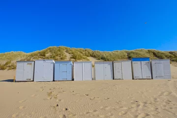 Zelfklevend Fotobehang Little beach cabins at a North Sea © Vincent Andriessen
