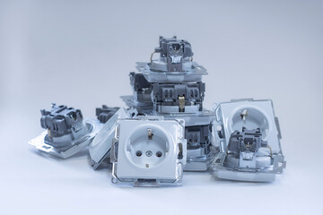 Home plastic sockets for electricity on a white background.