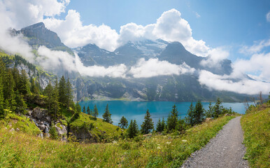 stunning mountain landscape lake Oeschinensee, bernese alps hiking trail switzerland