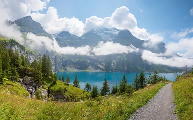 Acrylic prints Alps stunning mountain landscape lake Oeschinensee, bernese alps hiking trail switzerland