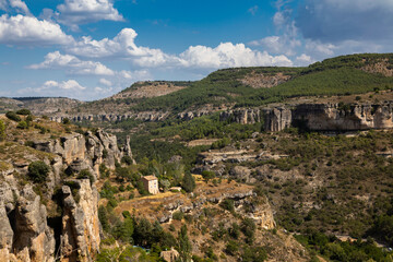 Fototapeta na wymiar Huecar river canyon, in the immediate vicinity of the city of Cuenca. Community of Castilla la Mancha. Spain