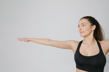 Fototapeta na wymiar Cropped photo of yoga woman practicing yoga asana in the studio. Mock-up.