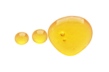 Golden yellow abstract oil bubbles or face serum drops isolated on white background. Oil bubbles macro photography. - 502275425