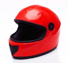 Car helmet in red color on a white background. Close-up