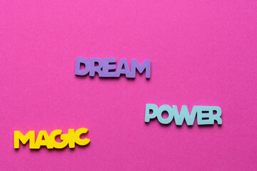 Color inspirational words: girl, power, magic, dream on a bright purple background
