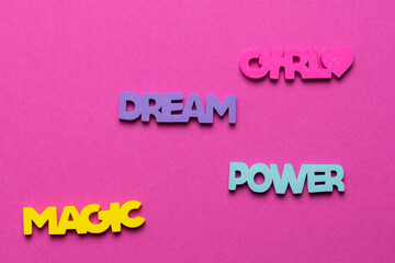 Color inspirational words: girl, power, magic, dream on a bright purple background