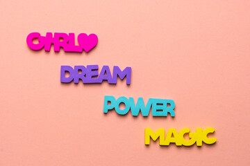 Color inspirational words: girl, power, magic, dream on a bright pink background