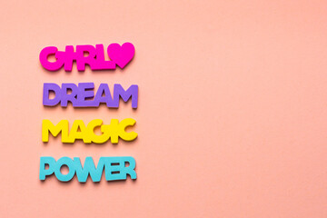 Color inspirational words: girl, power, magic, dream on a bright pink background