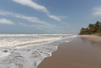 Amazing shot of colombian guajira beach with atlantic sea and blue sky