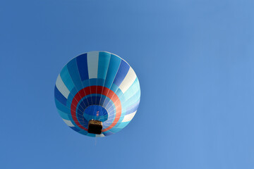 blue hot air balloon view from below