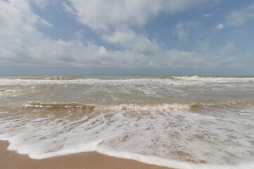 Atlantic sea viewed from colombian palomino beach in sunny midday