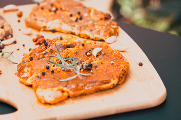 raw meat with herbs and rosemary ready for barbecue