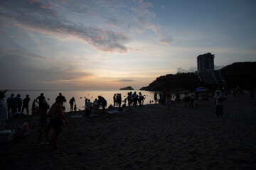 SANTA MARTA, COLOMBIA - Rodadero beach at sunset with a lot of tourist