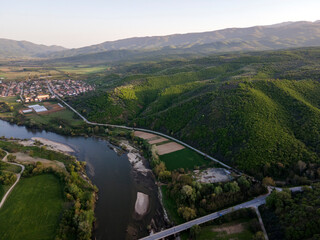 Naklejka premium Aerial Sunset view of Struma river passing, Bulgaria