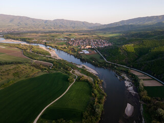 Aerial Sunset view of Struma river passing, Bulgaria