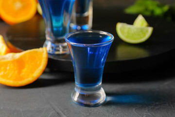 Shot cocktail on dark background, closeup