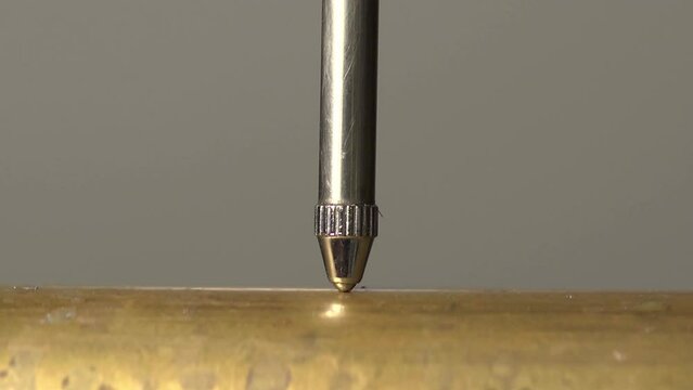 plunger deflection on a dial indicator, close up, seamless loop