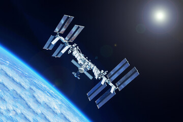 Iss over the planet Earth. Elements of this image furnished by NASA