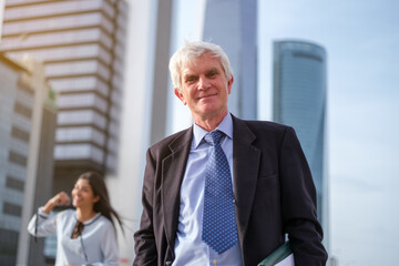 Portrait of businessman in business area