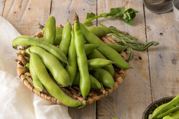 Fresh and raw green broad beans