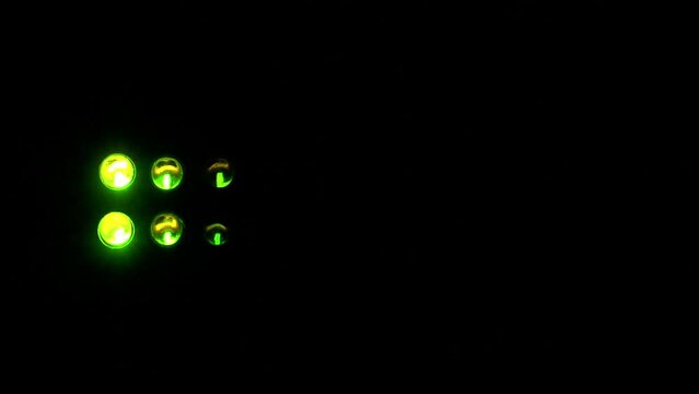 LED audio level indicators against a black background - Looping